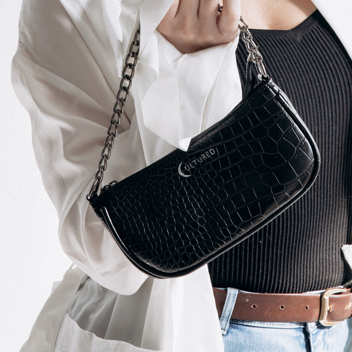 LEYLA MULTI POCHETTE CROSS BODY BAG